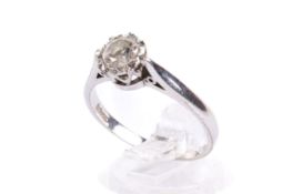 A 9ct white gold diamond solitaire ring. Set with one round brilliant cut diamond of 0.