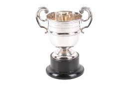 A Victorian silver twin handled trophy.