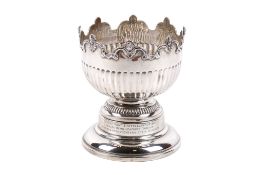 A Victorian rose bowl converted into a trophy cup.