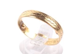 A 18ct gold ring.
