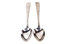 A pair of George III Irish silver serving spoons.