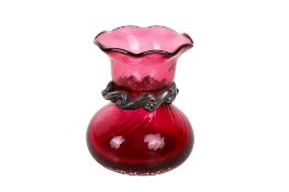 A small Britannia silver mounted cranberry glass vase.
