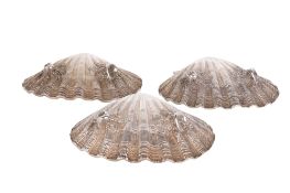 Three Spink & Son silver shell dishes.