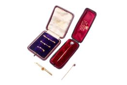 Two stick pins and four bar brooches.