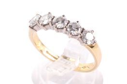 An 18ct gold and five stone diamond ring. Each round cut diamond circa 0.15-0.