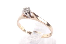 A 9ct gold diamond solitaire ring.