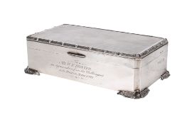 A 1950s silver cigarette box.