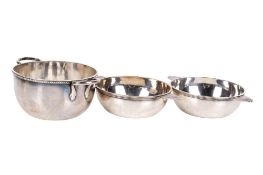 Three continental silver twin-handled dishes. Comprising a pair with fanned handles, marked 0.