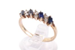 A 9ct gold, diamond and sapphire ring.