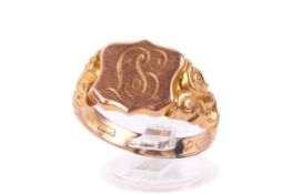 A 9ct gold sovereign shield ring.