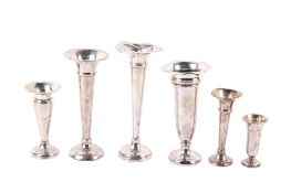 Six silver tulip vases. Weighted, with various hallmarks, tallest 17.8cm, gross weight 514.3g.