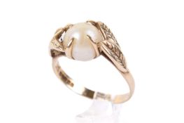A 9ct gold and pearl dress ring.