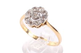 An 18ct gold and diamond cluster ring.