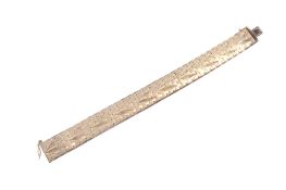 A gold plated bracelet.