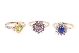 Three dress rings. Variously set with semi-precious stones and/or small diamonds or synthetics.