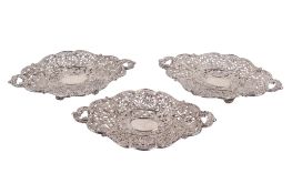 Three Chinese silver dishes by Wang Hing & Company.