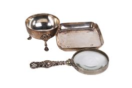 Three silver desk items.