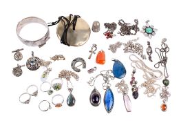 A collection of silver and white metal stone set jewellery.