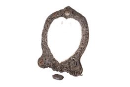 A Victorian silver heart table mirror and a silver vesta.