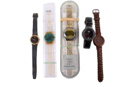 Five collectable boxed wristwatches.