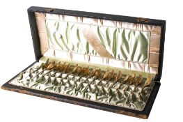 A late 19th century set of 17 silver coffee spoons.