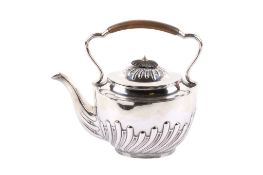 A late Victorian silver teapot.
