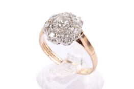 A 9ct gold cluster ring. Set with old brilliant cut diamonds of 0.