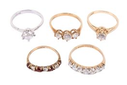 Five stone set rings. Comprising three hallmarked 9ct gold rings, gross weight 5.
