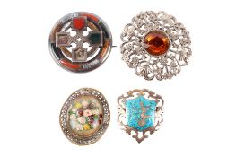 Four vintage brooches.