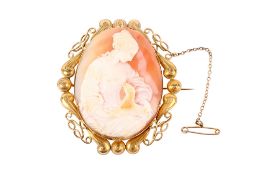 A yellow metal mounted shell cameo brooch.