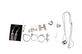 A boxed Christian Dior necklace and earring set and an assortment of silver and white metal