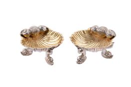 A pair of Victorian silver shell-shaped open salts.