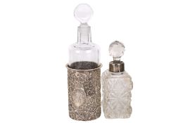 Two silver mounted scent bottles.