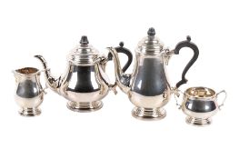 An Elizabeth II silver four-piece tea and coffee set.
