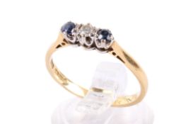 An 18ct gold diamond and sapphire ring.
