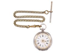 A silver cased pocket watch on an Albert chain.