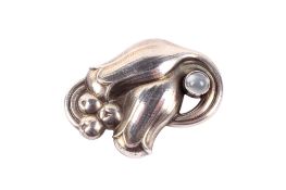 A Georg Jensen silver flower brooch.
