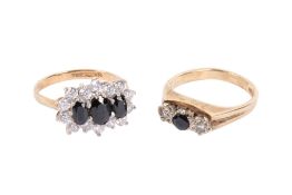 Two stone set dress rings.