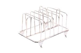 A George III silver toast rack.