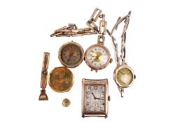 An assortment of yellow metal cased watches.