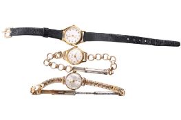 Three Accurist ladies' wristwatches.