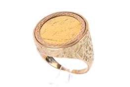 A 9ct gold ring mounted 1899 half sovereign coin. Size T, gross weight 11.