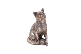 A weighted silver model of a cat.