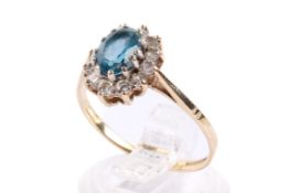 A 9ct gold and topaz cluster ring.