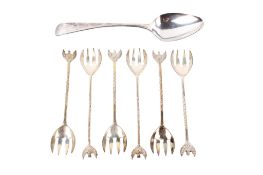 A Georgian silver spoon and a set of six white metal spoons.