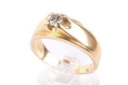 A yellow metal and diamond ring.