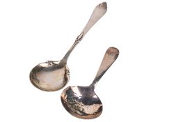 Two small silver spoons.