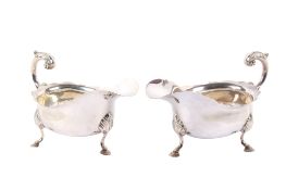 A pair of matched silver sauce boats.