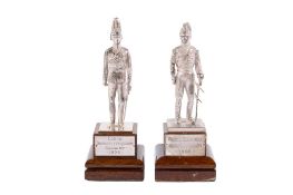 Two silver hallmarked figures modelled as cavalry army officers.