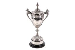 A Victorian large silver lidded twin handled trophy cup.